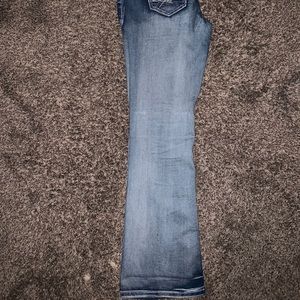 Distressed flare light wash jeans